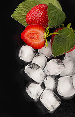 Image showing Ice cubes isolated on black