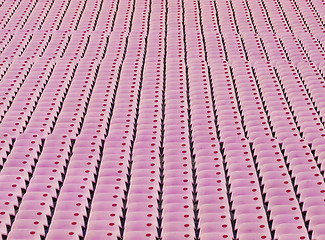 Image showing Audience seat in stadium with pink color