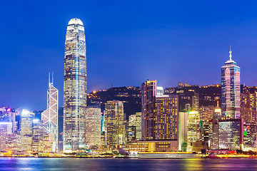 Image showing Hong Kong city skyline at night with Victoria Harbor and skyscra