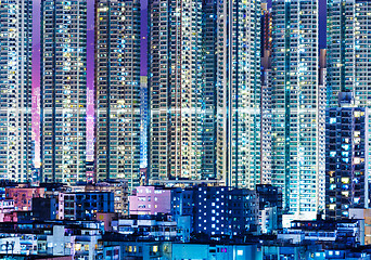 Image showing Overpopulated modern building in Hong Kong at night