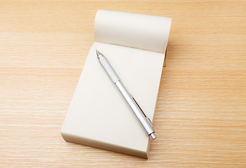 Image showing Memo pad and pen