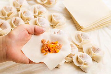 Image showing Wrapping of Chinese dumpling