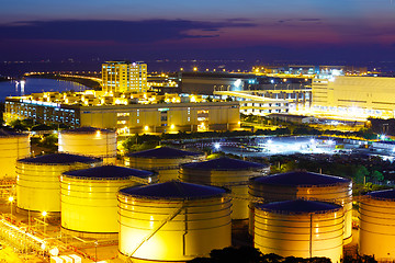 Image showing Oil tanks for cargo service at night