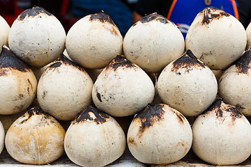 Image showing Young coconut drinks on street