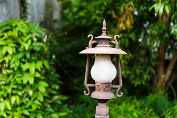 Image showing Street lamp in the green garden