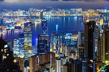 Image showing Hong Kong city skyline at night with Victoria Harbor and skyscra