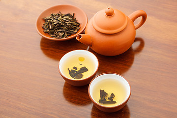 Image showing Chinese dried tea leave and drink