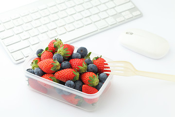 Image showing Healthy lunch box in working desk