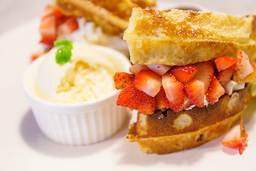 Image showing Waffles with ice-cream and strawberries