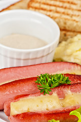 Image showing sausages with cheese and omelette