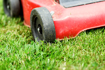 Image showing Lawnmower on grass