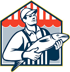 Image showing Fishmonger Holding Fish Retro