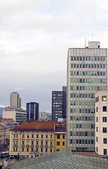 Image showing cityscape rooftop view  office buildings apartments condos busin