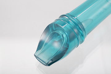 Image showing Macro shot of a blue plastic flute