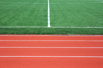 Image showing Soccer green field artificial grass with white lines 