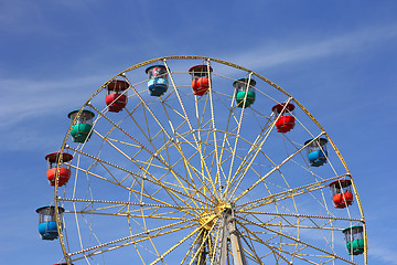 Image showing Atraktsion colorful ferris wheel against the blue sky