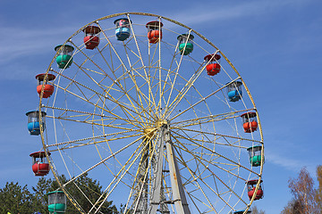 Image showing Atraktsion colorful ferris wheel against the blue sky