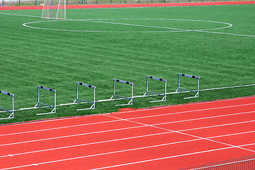 Image showing Soccer green field artificial grass with white lines 