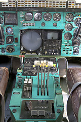 Image showing Airplane Cockpit thrust levers with hand on top for takeoff, Tu-