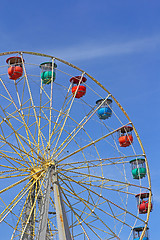 Image showing Atraktsion colorful ferris wheel against the blue sky