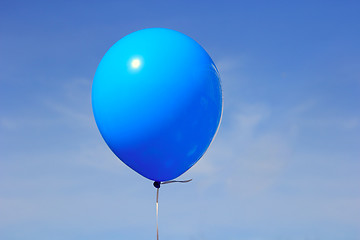 Image showing Inflatable balloon, photo on the against the blue sky