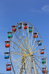 Image showing Atraktsion colorful ferris wheel against the blue sky