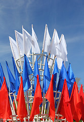 Image showing colored flags on a blue sky background