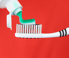 Image showing Toothbrush and Toothpaste