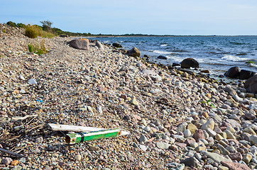 Image showing Jetsam at a rocky coast