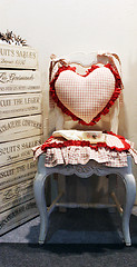 Image showing Chair with a heart shaped pillow