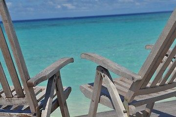 Image showing tropical beach chairs