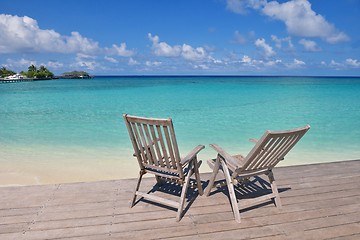 Image showing tropical beach chairs