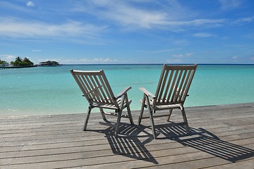 Image showing tropical beach chairs