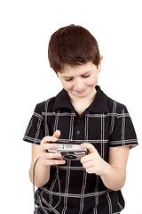 Image showing small boy checking analog camera settings