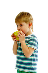 Image showing Little Boy Eating an Apple