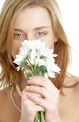 Image showing girl with white chrysanthemum