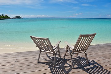 Image showing tropical beach chairs