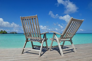 Image showing tropical beach chairs