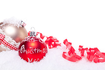 Image showing christmas decoration festive red bauble in snow isolated