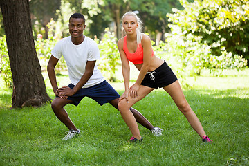 Image showing young couple runner jogger in park outdoor summer