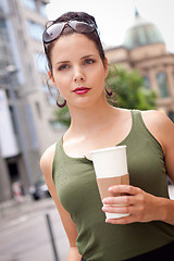 Image showing attractive woman with sunglasses in the city summertime