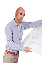 Image showing young adult businessman architect with blueprint 