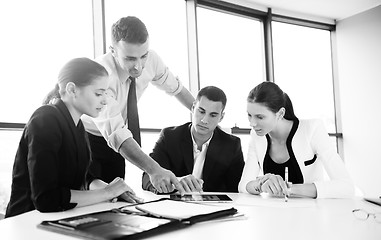 Image showing business people in a meeting at office