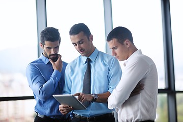 Image showing business man using tablet compuer at office