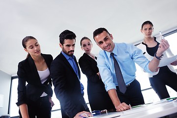 Image showing business people in a meeting at office