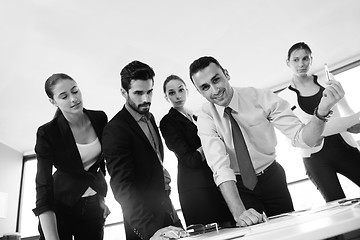 Image showing business people in a meeting at office