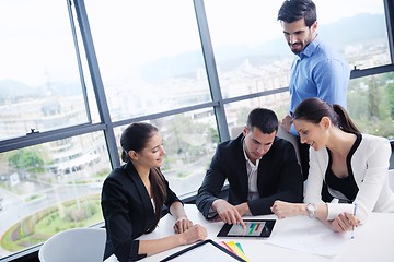 Image showing business people in a meeting at office