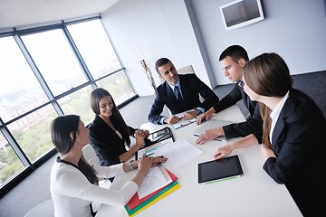 Image showing business people in a meeting at office