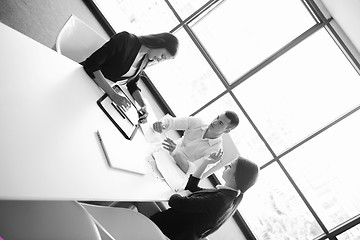 Image showing business people in a meeting at office