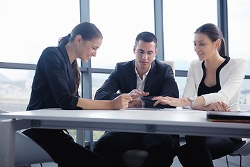 Image showing business people in a meeting at office